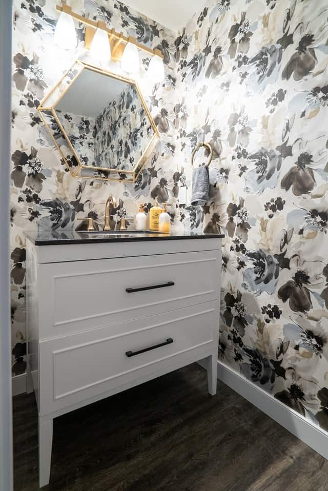 small bathroom with bold flower wallpaper