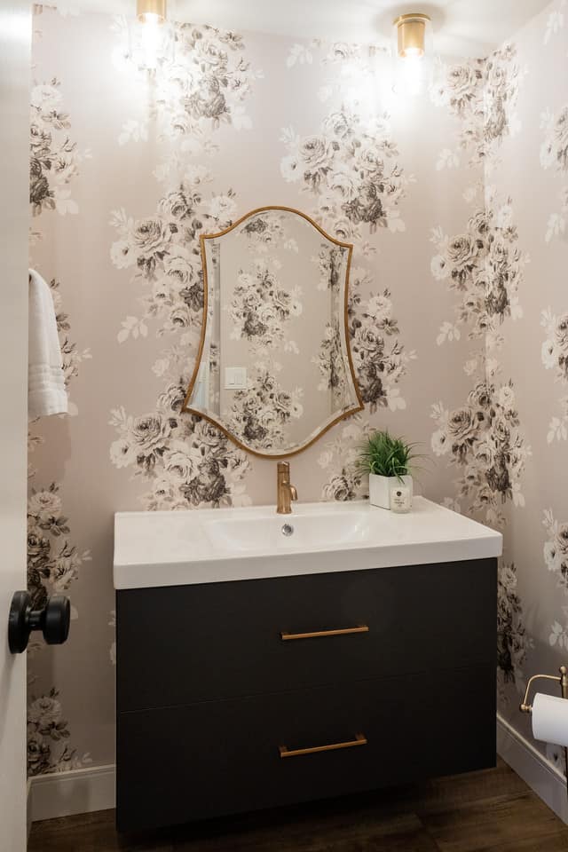 whimsical childrens bathroom remodel with cute flowery wallpaper