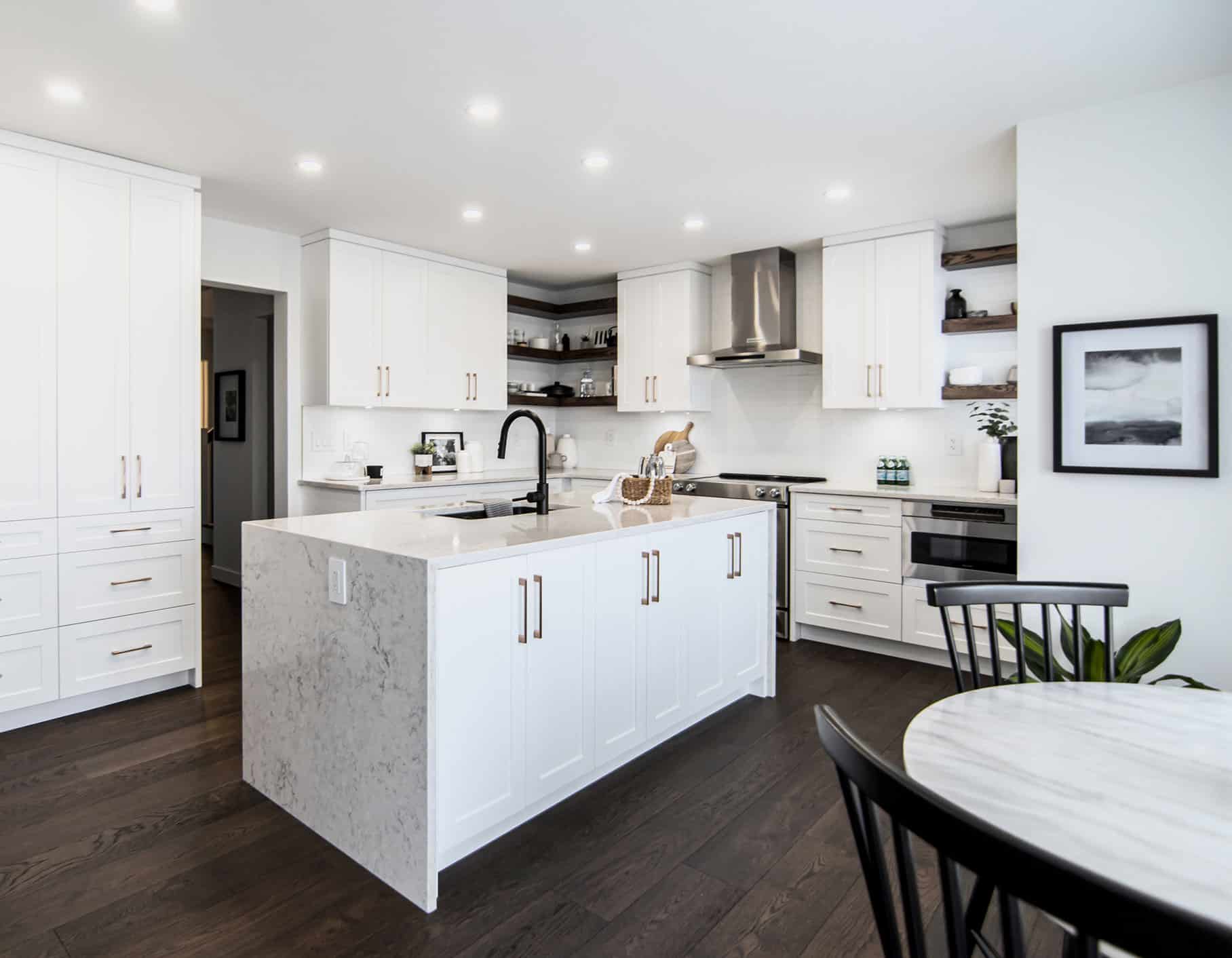 dark brown engineered hardwood flooring in bright white modern kitchen