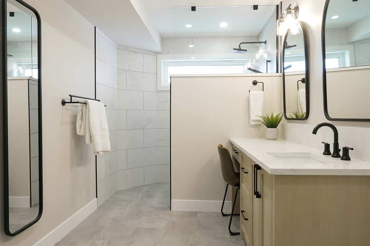 light tile in bright bathroom with curbless shower